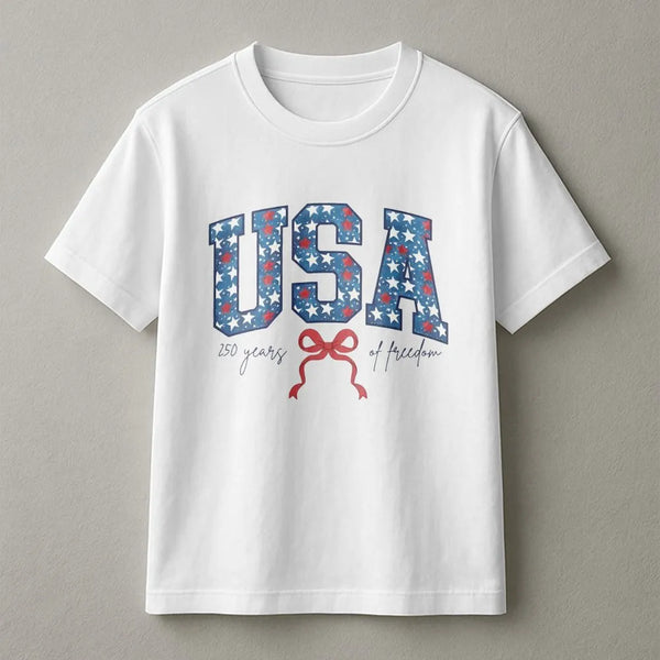 USA 250 Years of Freedom T-Shirt | Patriotic Star-Filled Varsity Leters with Coquette Bow | Soft Breathable Cotton Tee | Gift for July 4th Patriots