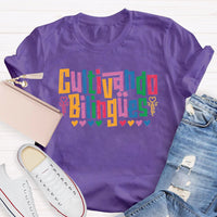 Cultivando Bilingües Bilingual Colored Heart T-shirt