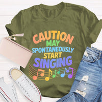 Caution May Spontaneously Start Singing Colorful Letters Teacher T-shirt