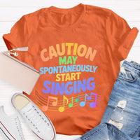 Caution May Spontaneously Start Singing Colorful Letters Teacher T-shirt
