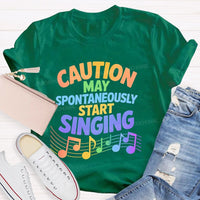 Caution May Spontaneously Start Singing Colorful Letters Teacher T-shirt