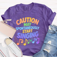 Caution May Spontaneously Start Singing Colorful Letters Teacher T-shirt