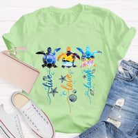 Purple and Pink Sea Turtle Swimming in Blue Ocean T-Shirt