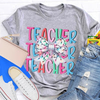 Festive Holiday Coquette Bow Shirt, Christmas Teacher Bow T-Shirt, Adorable Christmas Teacher Graphic Tee, Merry Xmas Educator Top