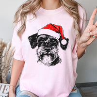 Santa Hat Dog T-Shirt, Schnauzer Christmas T-Shirt, Humorous Schnauzer Puppy T-Shirt, Adorable Holiday Dog Graphic Tee, Festive Dog Lover Present