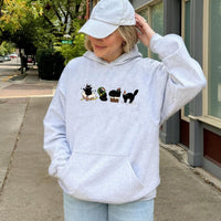 Festive Santa Kittens Holiday Sweatshirt, Christmas Black Cat Hoodie, Adorable Cat Mom Xmas Pullover, Comfy Spooky Furry Pet Lover Hooded Top